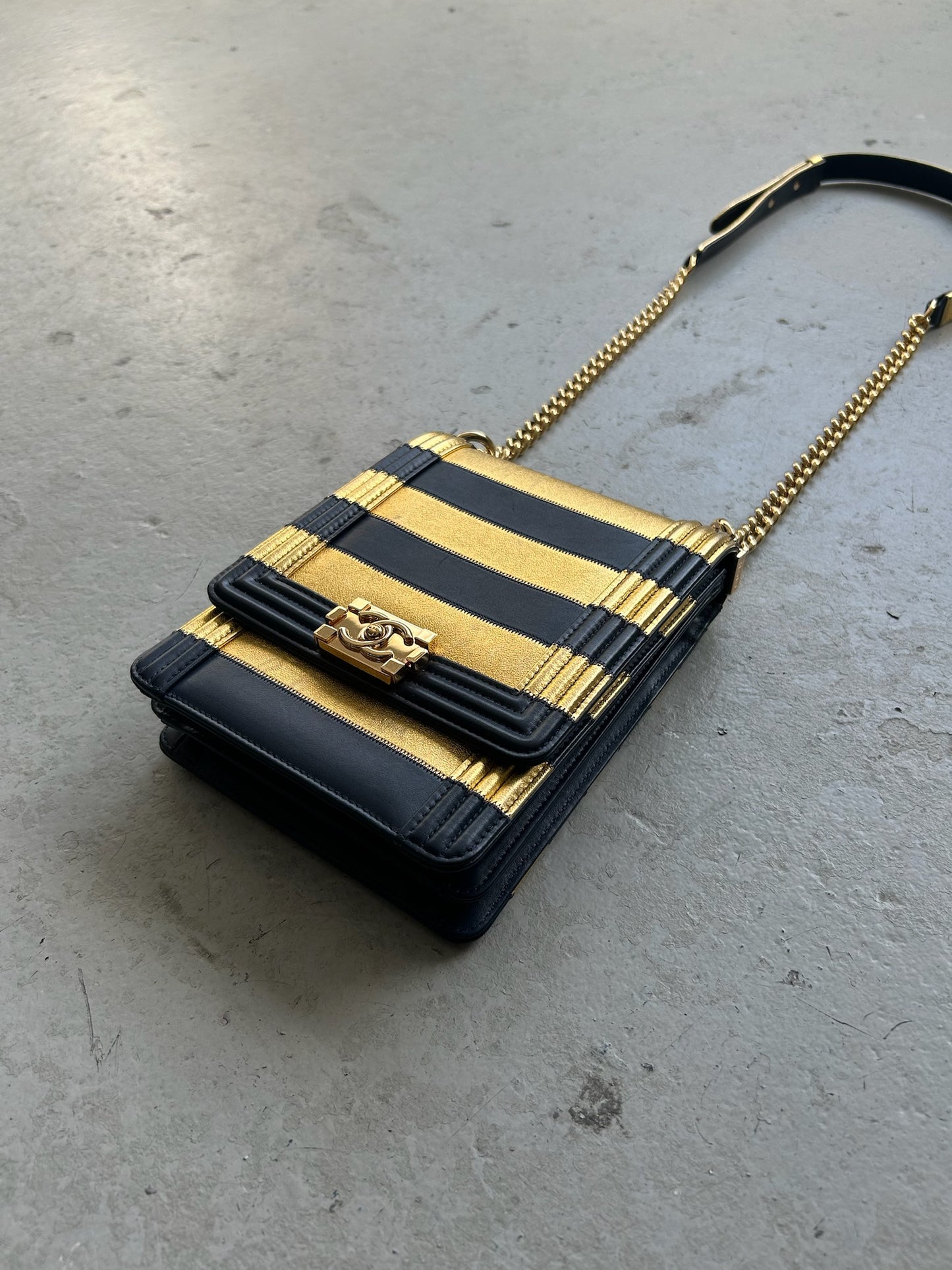 Chanel Metallic Lambskin Striped North South Boy Flap Cross Body Bag (OS)