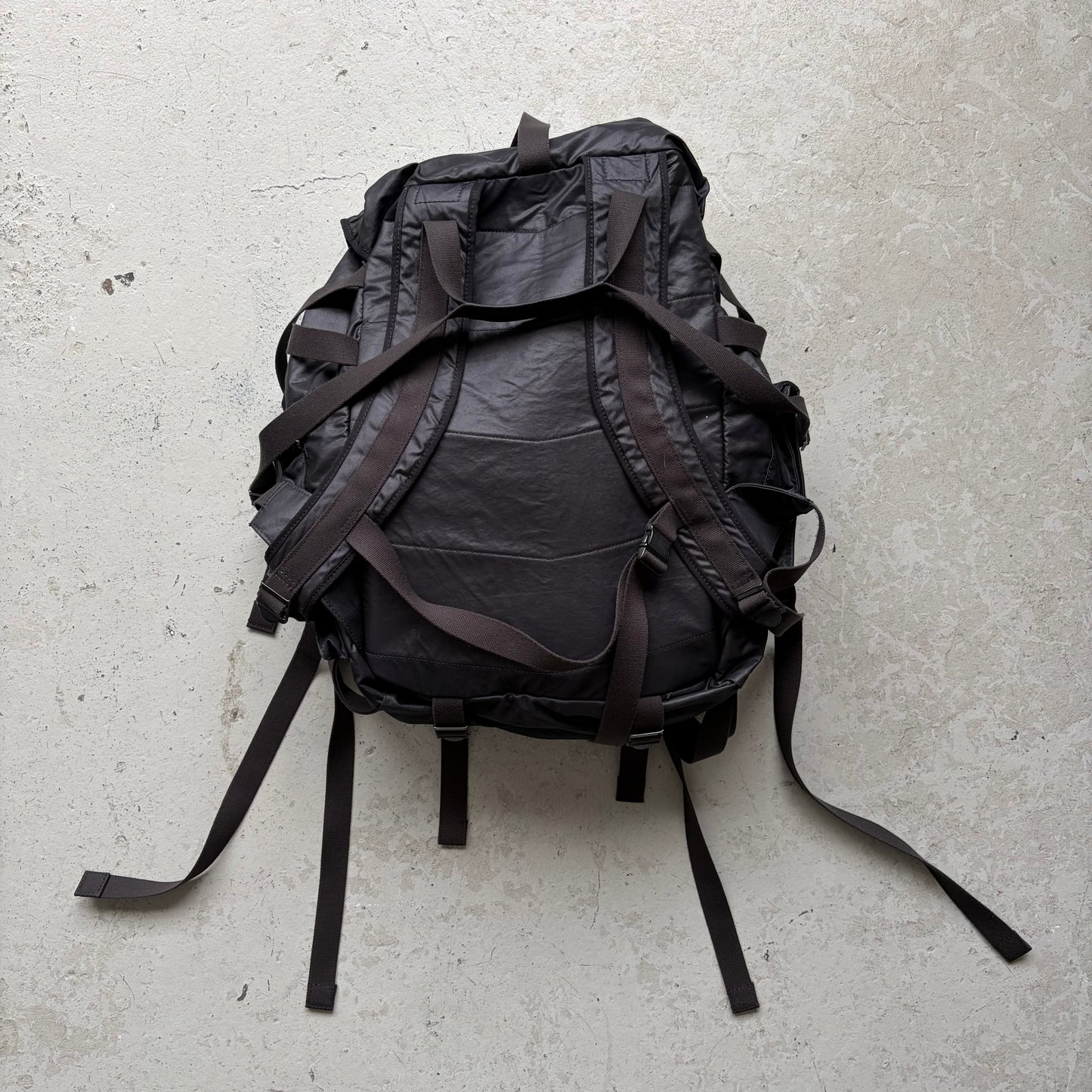 Julius SS24 Black Coated Memory Cloth Utility Backpack (OS)